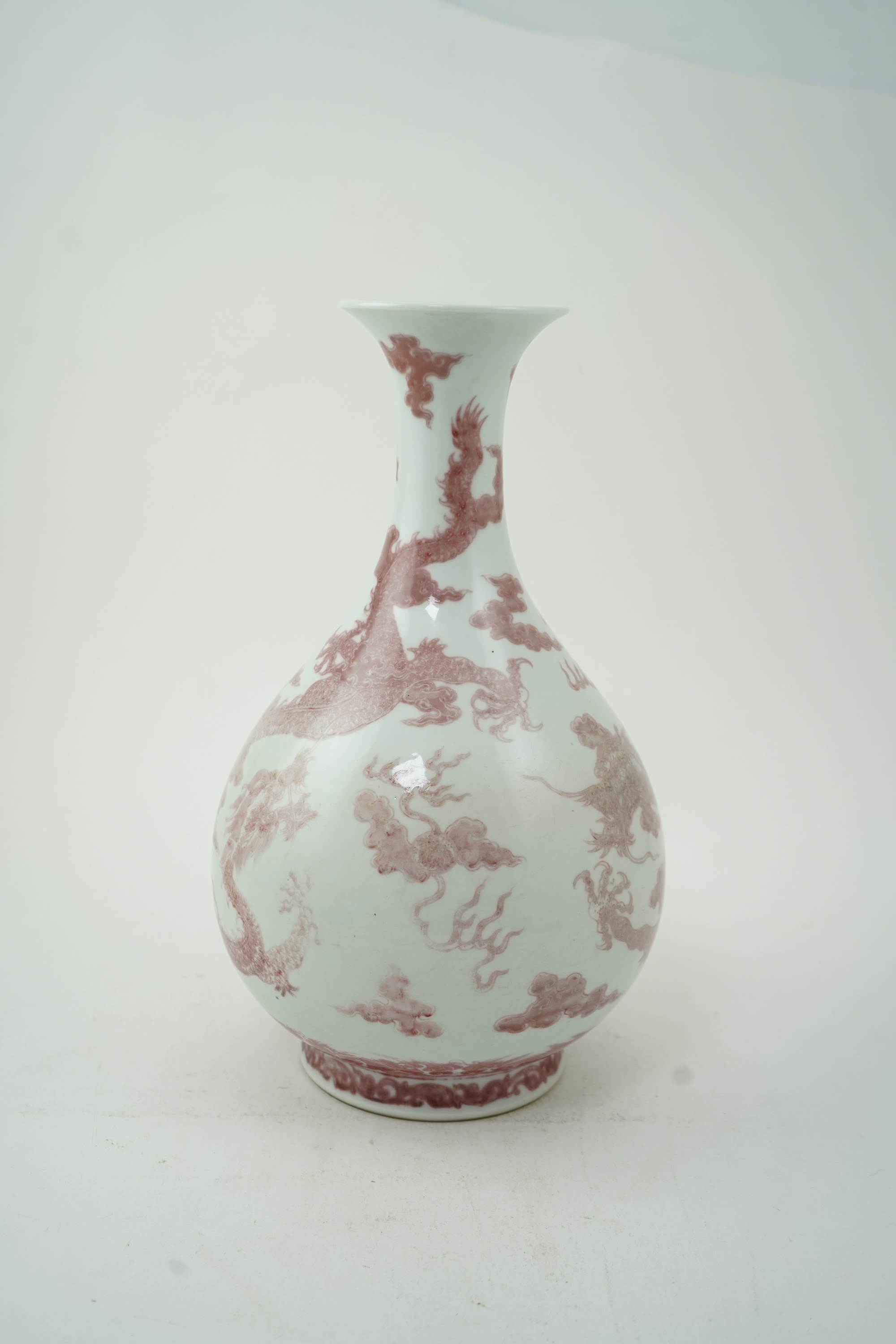 A Chinese underglaze copper-red ‘dragon’ bottle vase, yuhuchunping